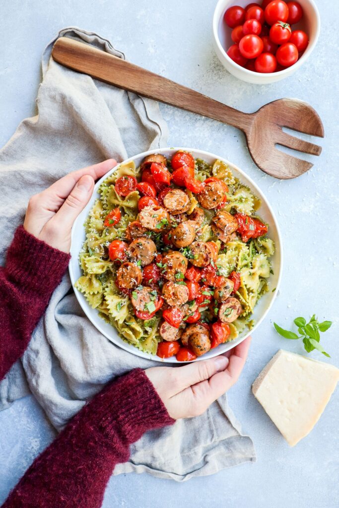 Arugula Pesto Pasta with Caprese Chicken Sausage - Gilbert's Craft Sausages